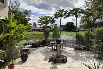 Golfers Family Paradise. Set on the 14th fairway of PGA's Palmer on PGA National Golf Club in Florida - for sale on GolfHomes.com, golf home, golf lot