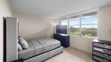 Experience the charm of Palm Aire in this beautifully updated on Palm-Aire Country Club and Resort - The Oaks in Florida - for sale on GolfHomes.com, golf home, golf lot