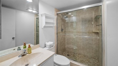 Experience the charm of Palm Aire in this beautifully updated on Palm-Aire Country Club and Resort - The Oaks in Florida - for sale on GolfHomes.com, golf home, golf lot