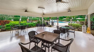 Experience the charm of Palm Aire in this beautifully updated on Palm-Aire Country Club and Resort - The Oaks in Florida - for sale on GolfHomes.com, golf home, golf lot