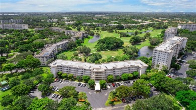 Experience the charm of Palm Aire in this beautifully updated on Palm-Aire Country Club and Resort - The Oaks in Florida - for sale on GolfHomes.com, golf home, golf lot