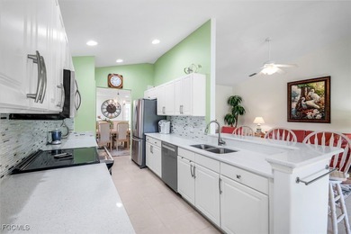 TURNKEY COACH HOME WITH PRESERVE VIEW IN COLONIAL COUNTRY CLUB! on Colonial Country Club in Florida - for sale on GolfHomes.com, golf home, golf lot