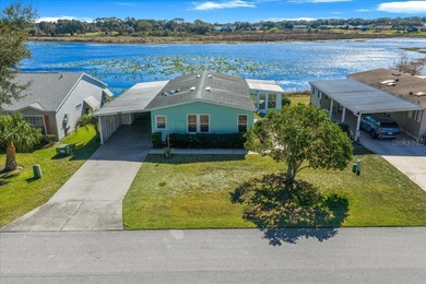 Wake up every day to peaceful water views and easy Florida on Plantation Golf Club in Florida - for sale on GolfHomes.com, golf home, golf lot