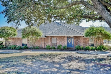 This one-owner 3-2-2 brick home sits on 1.8 acres of land that on Pecan Plantation Country Club in Texas - for sale on GolfHomes.com, golf home, golf lot