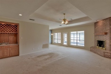 This one-owner 3-2-2 brick home sits on 1.8 acres of land that on Pecan Plantation Country Club in Texas - for sale on GolfHomes.com, golf home, golf lot