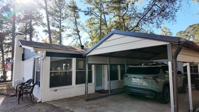 Beautiful home perched on a hill overlooking a scenic view of on Hide-A-Way Lake Golf Course in Texas - for sale on GolfHomes.com, golf home, golf lot