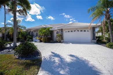 EXPERIENCE PANORAMIC WIDE BASIN & ENDLESS INTERSECTING CANAL on Saint Andrews South Golf Club in Florida - for sale on GolfHomes.com, golf home, golf lot