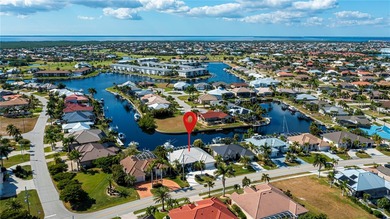 EXPERIENCE PANORAMIC WIDE BASIN & ENDLESS INTERSECTING CANAL on Saint Andrews South Golf Club in Florida - for sale on GolfHomes.com, golf home, golf lot