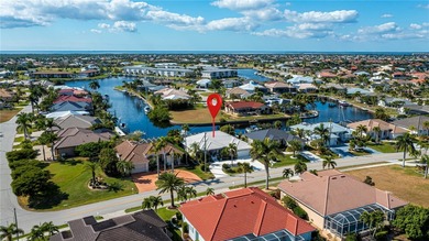EXPERIENCE PANORAMIC WIDE BASIN & ENDLESS INTERSECTING CANAL on Saint Andrews South Golf Club in Florida - for sale on GolfHomes.com, golf home, golf lot