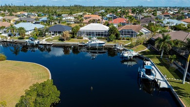 EXPERIENCE PANORAMIC WIDE BASIN & ENDLESS INTERSECTING CANAL on Saint Andrews South Golf Club in Florida - for sale on GolfHomes.com, golf home, golf lot