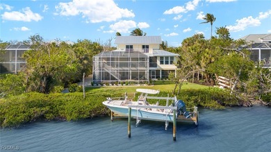 Stunning Waterfront Elevated 3-Story Home with Breathtaking on The Sanctuary Golf Club in Florida - for sale on GolfHomes.com, golf home, golf lot