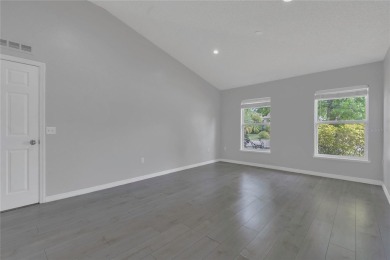 Renovated and stunning 4-bedroom, 2-bath pool home offers the on Royal St. Cloud Golf Links in Florida - for sale on GolfHomes.com, golf home, golf lot
