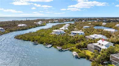 Stunning Waterfront Elevated 3-Story Home with Breathtaking on The Sanctuary Golf Club in Florida - for sale on GolfHomes.com, golf home, golf lot
