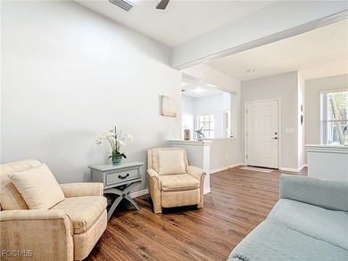 This sunny END UNIT attached villa in HERONS GLEN COUNTRY CLUB's on Herons Glen Golf and Country Club in Florida - for sale on GolfHomes.com, golf home, golf lot