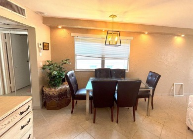 VIEW! VIEW! VIEW! Beautiful waterfront unit! Spacious, Partially on Kings Point Golf -Flanders Way in Florida - for sale on GolfHomes.com, golf home, golf lot