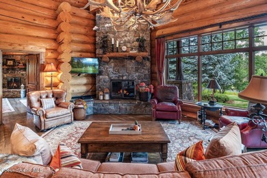 LUXURIOUS LOG HOME AT PRESTIGIOUS BLACK ROCK. Tucked on a serene on The Golf Club at Black Rock in Idaho - for sale on GolfHomes.com, golf home, golf lot