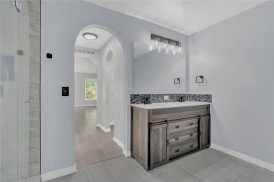 Renovated and stunning 4-bedroom, 2-bath pool home offers the on Royal St. Cloud Golf Links in Florida - for sale on GolfHomes.com, golf home, golf lot