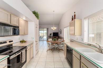 Welcome to this beautifully maintained 2bed, 2bath, home located on Coyote Lakes Golf Club in Arizona - for sale on GolfHomes.com, golf home, golf lot