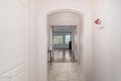 Welcome to this beautifully maintained 2bed, 2bath, home located on Coyote Lakes Golf Club in Arizona - for sale on GolfHomes.com, golf home, golf lot