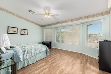 Welcome to this beautifully maintained 2bed, 2bath, home located on Coyote Lakes Golf Club in Arizona - for sale on GolfHomes.com, golf home, golf lot