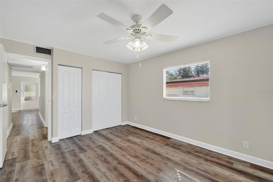 This bright condo features a living room-dining room combination on Sandpiper Golf Club in Florida - for sale on GolfHomes.com, golf home, golf lot