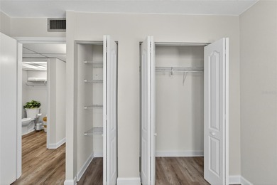 This bright condo features a living room-dining room combination on Sandpiper Golf Club in Florida - for sale on GolfHomes.com, golf home, golf lot