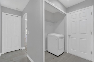 Renovated and stunning 4-bedroom, 2-bath pool home offers the on Royal St. Cloud Golf Links in Florida - for sale on GolfHomes.com, golf home, golf lot