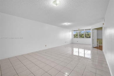 Well-maintained, updated 4th floor condo unit, featuring a split on Sunrise Lakes Phase IV Golf Course in Florida - for sale on GolfHomes.com, golf home, golf lot