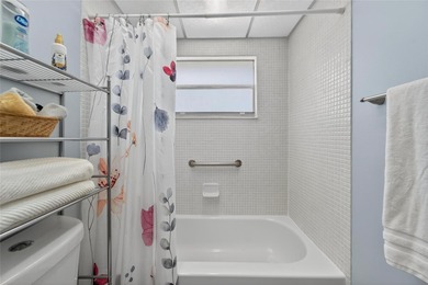 This bright condo features a living room-dining room combination on Sandpiper Golf Club in Florida - for sale on GolfHomes.com, golf home, golf lot