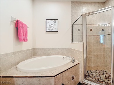 This sunny END UNIT attached villa in HERONS GLEN COUNTRY CLUB's on Herons Glen Golf and Country Club in Florida - for sale on GolfHomes.com, golf home, golf lot