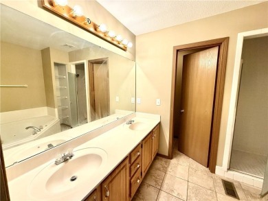 This spacious half-duplex in Golf View Villas features both on Teetering Rocks Links in Missouri - for sale on GolfHomes.com, golf home, golf lot