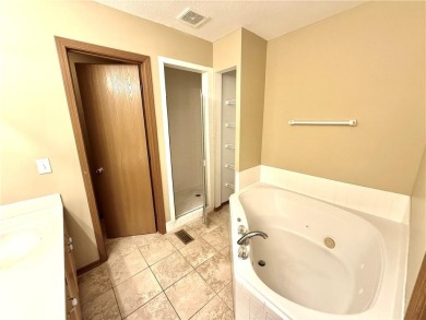 This spacious half-duplex in Golf View Villas features both on Teetering Rocks Links in Missouri - for sale on GolfHomes.com, golf home, golf lot