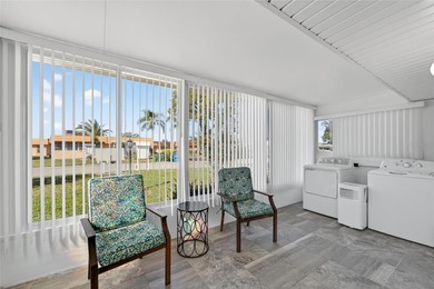 This bright condo features a living room-dining room combination on Sandpiper Golf Club in Florida - for sale on GolfHomes.com, golf home, golf lot