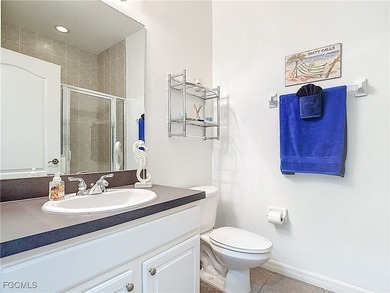 This sunny END UNIT attached villa in HERONS GLEN COUNTRY CLUB's on Herons Glen Golf and Country Club in Florida - for sale on GolfHomes.com, golf home, golf lot