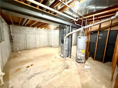 This spacious half-duplex in Golf View Villas features both on Teetering Rocks Links in Missouri - for sale on GolfHomes.com, golf home, golf lot
