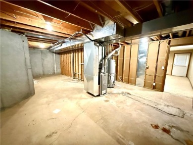 This spacious half-duplex in Golf View Villas features both on Teetering Rocks Links in Missouri - for sale on GolfHomes.com, golf home, golf lot