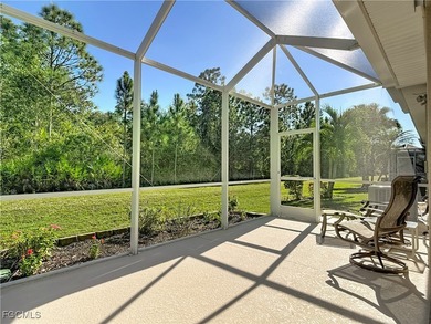 This sunny END UNIT attached villa in HERONS GLEN COUNTRY CLUB's on Herons Glen Golf and Country Club in Florida - for sale on GolfHomes.com, golf home, golf lot