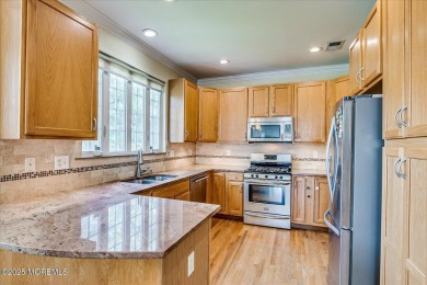 This warm and inviting 3-bedroom, 2.5-bath home sits in a on Forsgate Country Club in New Jersey - for sale on GolfHomes.com, golf home, golf lot