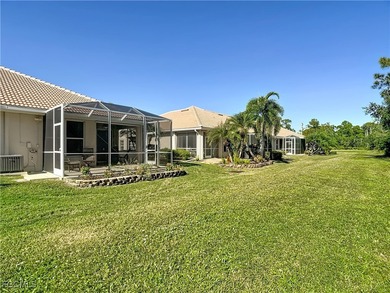 This sunny END UNIT attached villa in HERONS GLEN COUNTRY CLUB's on Herons Glen Golf and Country Club in Florida - for sale on GolfHomes.com, golf home, golf lot