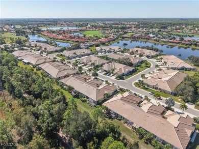This sunny END UNIT attached villa in HERONS GLEN COUNTRY CLUB's on Herons Glen Golf and Country Club in Florida - for sale on GolfHomes.com, golf home, golf lot