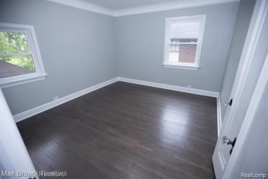 Beautifully renovated in 2025, this spacious home offers six on Detroit Golf Club  in Michigan - for sale on GolfHomes.com, golf home, golf lot