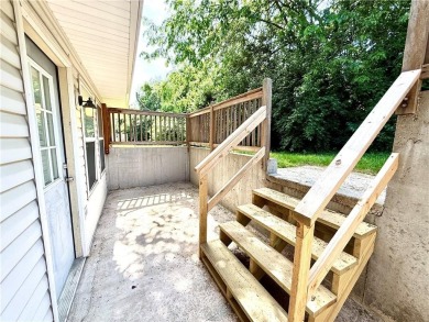 This spacious half-duplex in Golf View Villas features both on Teetering Rocks Links in Missouri - for sale on GolfHomes.com, golf home, golf lot