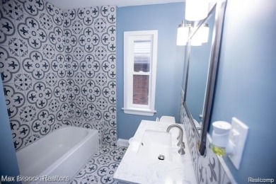 Beautifully renovated in 2025, this spacious home offers six on Detroit Golf Club  in Michigan - for sale on GolfHomes.com, golf home, golf lot