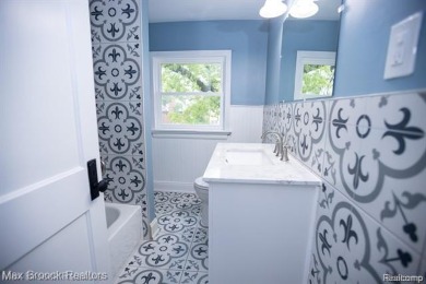 Beautifully renovated in 2025, this spacious home offers six on Detroit Golf Club  in Michigan - for sale on GolfHomes.com, golf home, golf lot