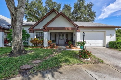 Welcome to this stunning two bedroom, two bath villa nestled in on Highland Lakes Executive Golf Course in Florida - for sale on GolfHomes.com, golf home, golf lot