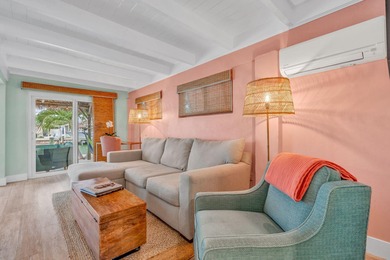 Step inside and experience the kind of tropical ease people on Key Colony Beach Golf Course in Florida - for sale on GolfHomes.com, golf home, golf lot