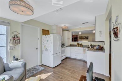 Welcome to this stunning two bedroom, two bath villa nestled in on Highland Lakes Executive Golf Course in Florida - for sale on GolfHomes.com, golf home, golf lot