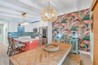 Step inside and experience the kind of tropical ease people on Key Colony Beach Golf Course in Florida - for sale on GolfHomes.com, golf home, golf lot