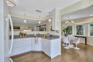 Welcome to this stunning two bedroom, two bath villa nestled in on Highland Lakes Executive Golf Course in Florida - for sale on GolfHomes.com, golf home, golf lot