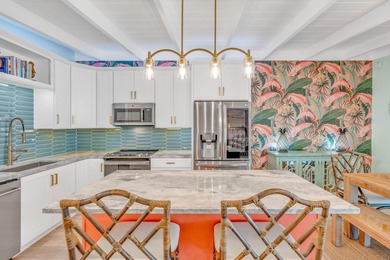 Step inside and experience the kind of tropical ease people on Key Colony Beach Golf Course in Florida - for sale on GolfHomes.com, golf home, golf lot